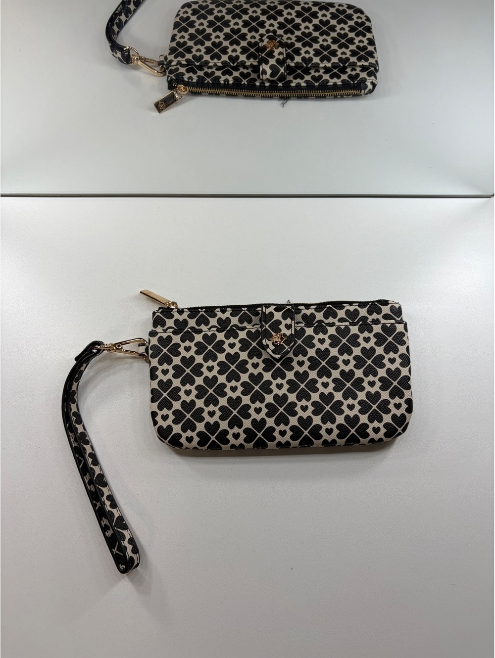 Nanette Lepore Black and White Patterned Wristlet Clutch